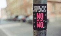 A sign that says 'no means no' attached to a post
